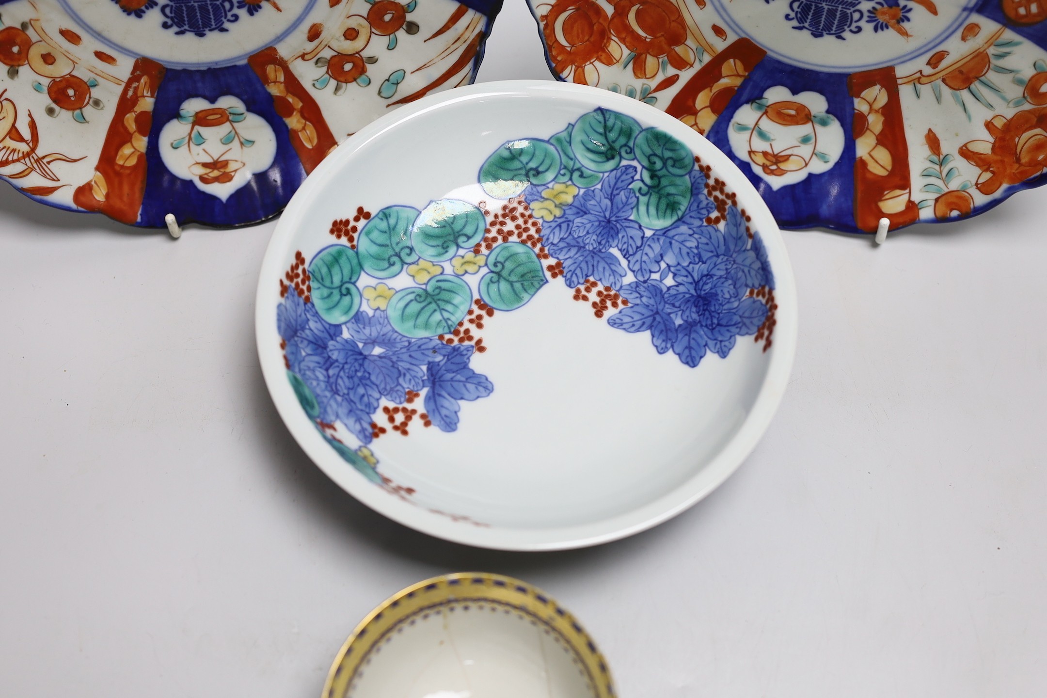 Two Japanese Imari dishes 22cms diameter, a Nabeshima style bowl and a Chinese tea bowl